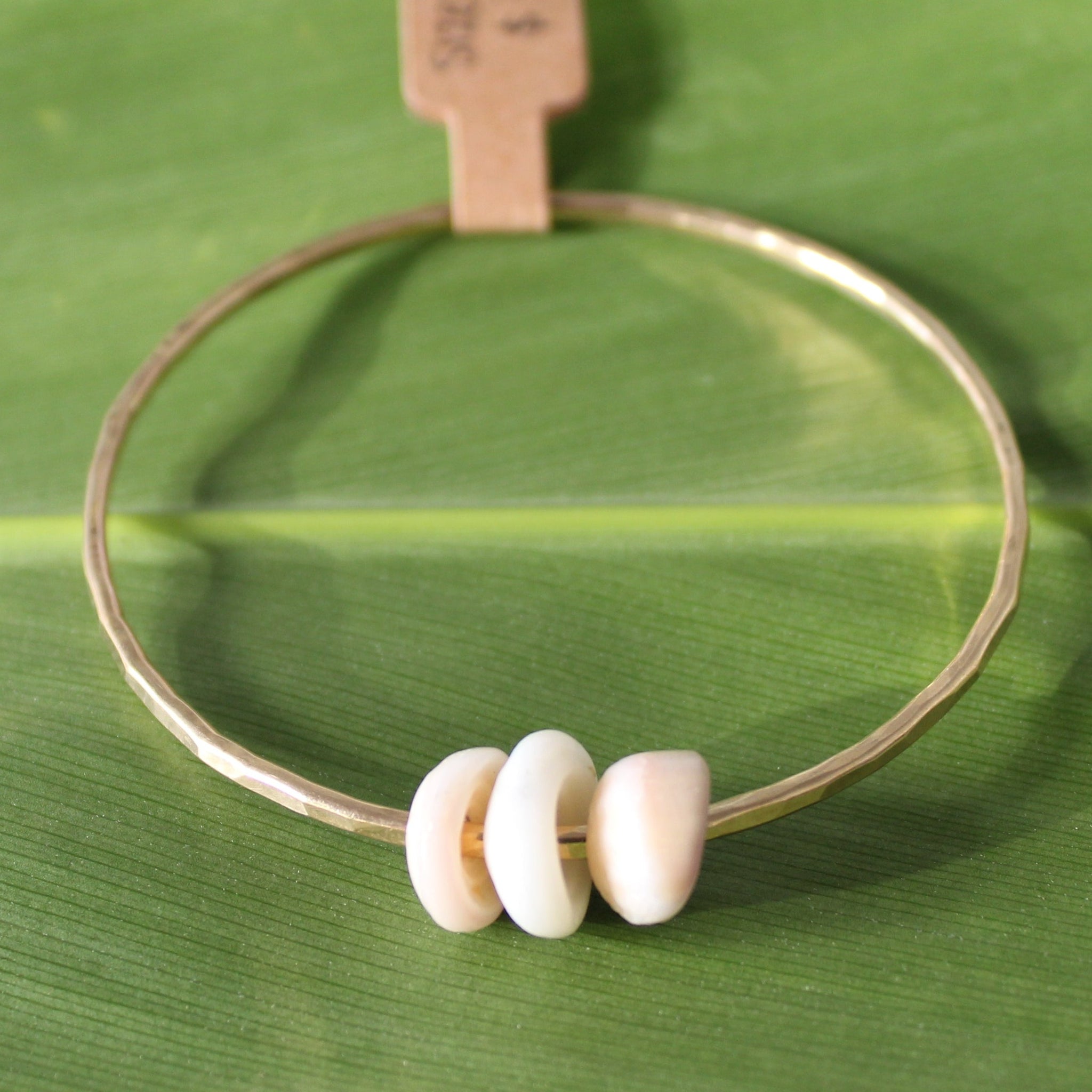 Size 7.5 Gold 12 GA - Puka Shell Bangle